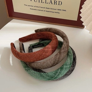 Set of four thick padded sponge headbands in retro textured woven fabric colors