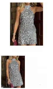 Detail view of silver sequin evening dress showing fabric texture and material specifications