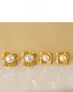 Detail of 18K gold plated Baroque pearl stud earrings with vintage geometric frames