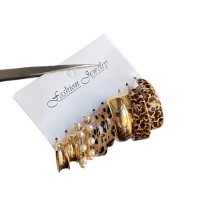 Ten-piece set of gold metal, acrylic pearl, and leopard print C-shape hoop earrings