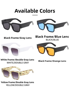 Flat lay of rectangle sunglasses in black, white, and tortoiseshell frames with tinted lenses