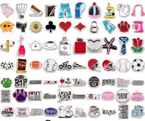 Macro view of various alloy floating charms for DIY locket jewelry making and decoration