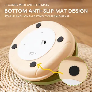 Bottom view of automatic butterfly cat toy with non-slip pads and battery compartment