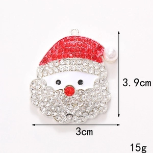 Detailed view of Santa Claus charm with red crystals and dimensions of 3.9cm by 3cm