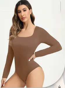 Close-up of brown long sleeve ribbed bodysuit featuring a square neck and elastic fabric