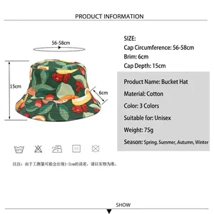 Reversible bucket hat with orange fruit print showing dimensions and cotton material specs