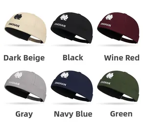 Detail view showing six color options of embroidered DINGHAN docker hats in grid layout