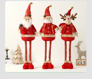 Detail of telescopic Christmas figures with red sequins and gold snowflake embroidery