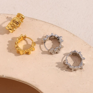 Modern 18K gold and silver plated stainless steel huggie earrings with lava texture design