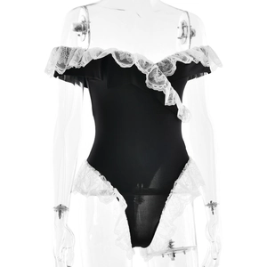 Detail of white lace ruffles on black off-the-shoulder bodysuit with high-cut leg trim