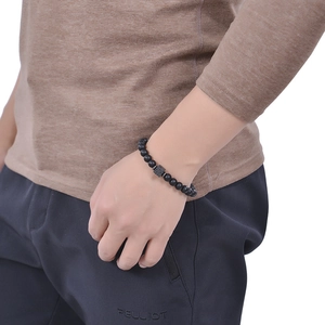 Men's 8mm matte black bead bracelet with a textured square lava stone centerpiece