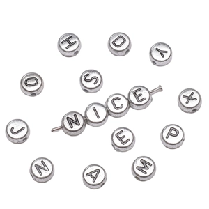Silver 4x7mm acrylic letter beads for DIY necklaces with NICE lettering on white background