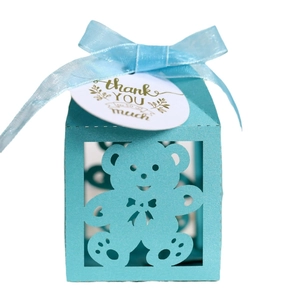 Light blue hollow laser cut baby shower favor box with ribbon and bear gift tag
