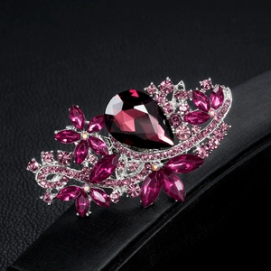 Elegant vintage crystal brooch with teardrop red gemstone and pink floral rhinestones