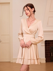 Elegant champagne satin V-neck mini dress with lantern sleeves and a slim waist design