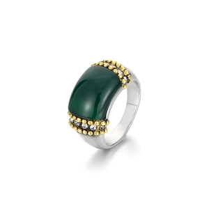 Retro titanium steel ring featuring a large green cat eye stone and cubic zirconia accents