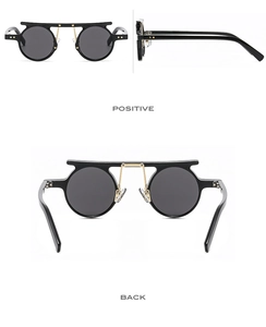 Detailed views of punk round sunglasses with gold bridge and black gothic frame accents