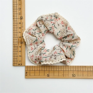 Floral fabric hair scrunchie with lace trim and pink flower patterns, 12cm diameter size