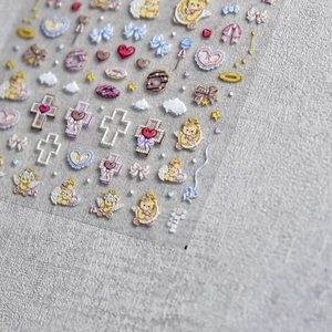 3D embossed nail art stickers featuring cute angels, bears, and bows in pastel colors