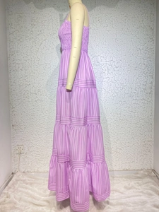 Detail view of purple vertical stripe maxi dress with pleated texture and tiered hem