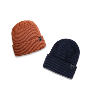 Navy and rust red ribbed knit beanies with leather patch in autumn style for men and women