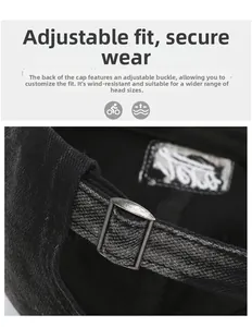 Detail of adjustable metal buckle and vintage washed denim texture on baseball cap