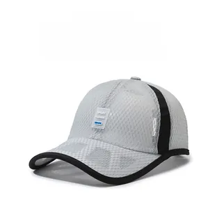 Detail of grey mesh fabric and transparent SPORT FASHION logo on the baseball cap