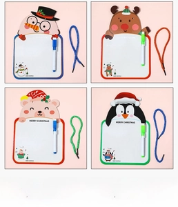 Detailed view of four Christmas character whiteboards with pens and hanging ropes