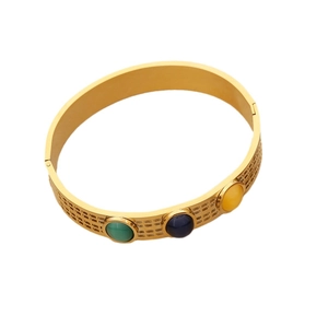 Vintage gold stainless steel bangle with cat-eye stones and textured grid pattern