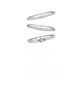Detailed view of S925 sterling silver ring set featuring unique hammered and brushed textures