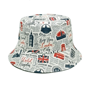 Detail of London themed graffiti print on cotton bucket hat with iconic city landmarks