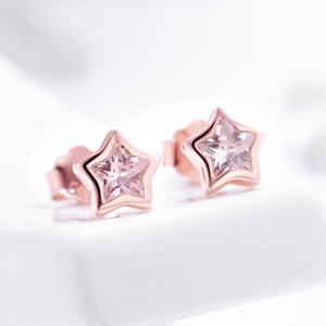Boucles d'oreilles étoiles en argent s925 avec pierre rose et finition or rose