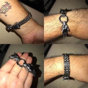 Men's vintage stainless steel wolf head Franco link chain bracelet with a rustic silver finish