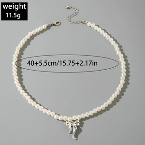 Detail of pearl necklace with bow pendant showing weight 11.5g and length 40+5.5cm