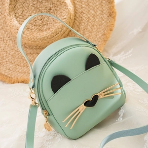 Light green cat-themed mini backpack with cute ears and adjustable strap for women