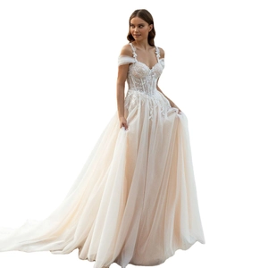 Off-shoulder A-line wedding dress with lace embroidery and layered tulle train