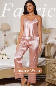 Detailed macro view of the premium light pink satin fabric with high gloss and smooth texture