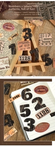Macro view of vintage style washi stickers with numbers and industrial labels for journals