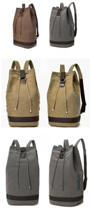 Detail view of canvas drawstring backpack with leather flap in coffee, grey, and khaki colors