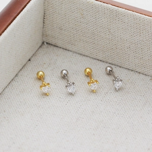 Macro detail of S925 silver heart-shaped zircon stud earrings with screw back design