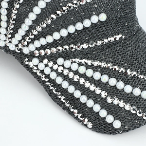 Women's dark gray mesh baseball cap with pearl and rhinestone embellishments on brim