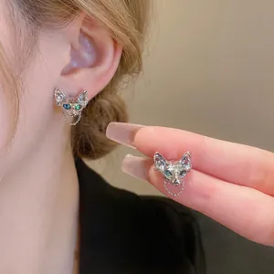 Silver Sphinx cat stud earrings with black gemstone eyes and delicate bead chain fringe