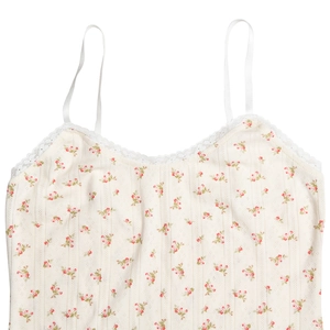 Detail of floral print camisole with white lace trim and adjustable spaghetti straps