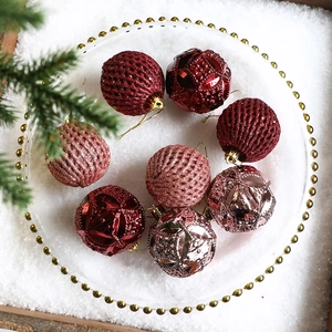 Set of 8 red and pink Christmas ball ornaments with glitter and geometric patterns