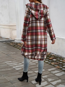 Outdoor back view of casual hooded color-block cardigan with red and brown plaid