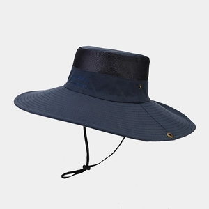 Close-up of navy outdoor sun hat featuring breathable mesh vents and sport embroidery