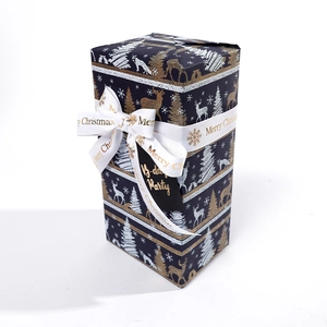 Vintage dark blue Christmas wrapping paper with elk pattern and Merry Christmas ribbon