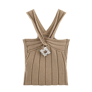 Close-up of khaki ribbed knit halter top featuring a sparkling diamond rhinestone accent