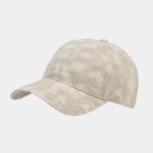 Detail of washed tie-dye cotton fabric with marble texture on baseball cap
