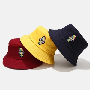 Cotton bucket hats with rainbow mushroom embroidery in red yellow and navy blue colors